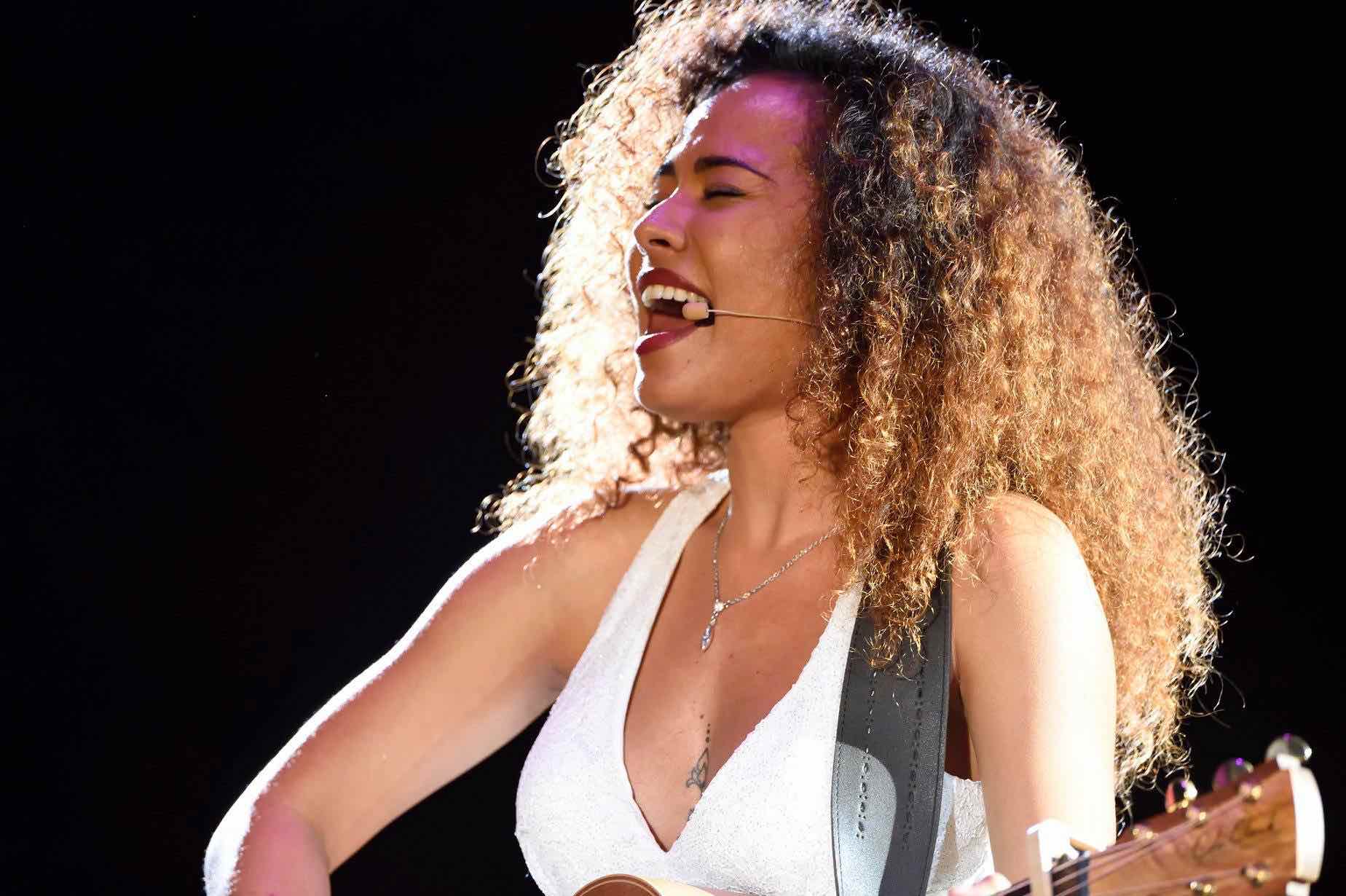Sam Clark Kaweyova performing for PNC Ball, Port Moresby